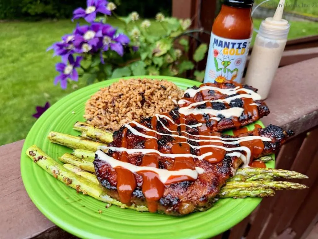 Pork Shoulder Steaks 42 | GrillinFools Plated and Sauced Pork Shoulder Steaks